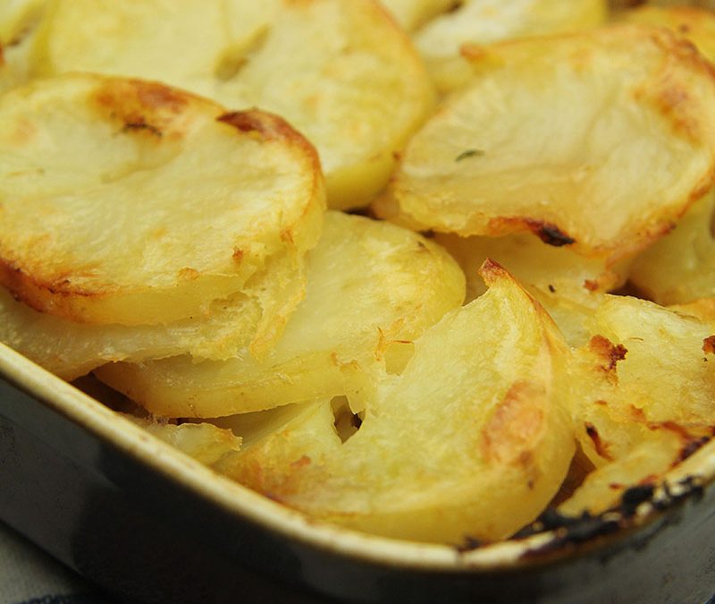 Braised Pork with Prunes and a Potato Top